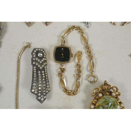 665 - A collection of costume jewellery including some silver