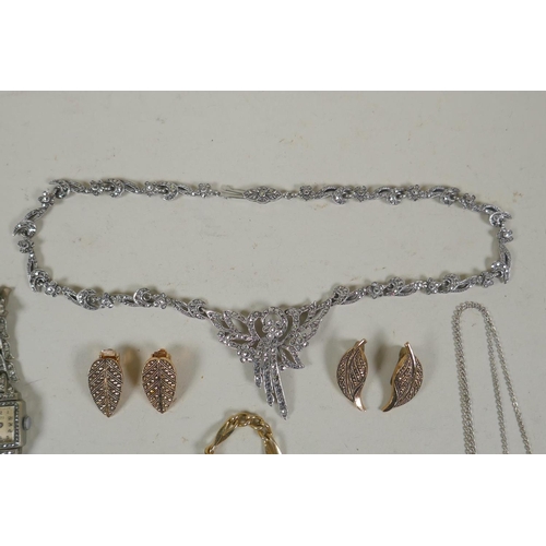 665 - A collection of costume jewellery including some silver