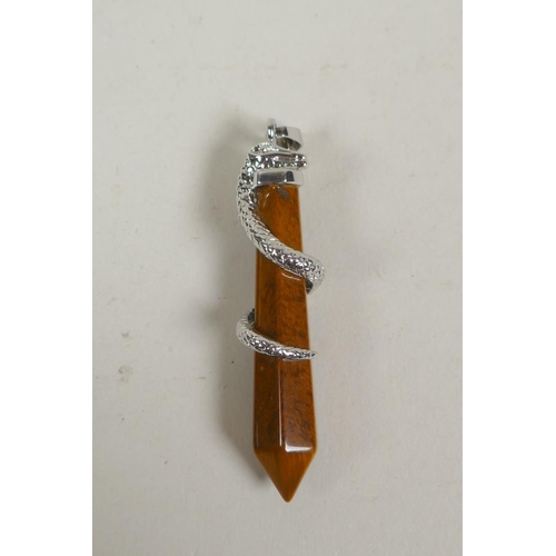 667 - A metal mounted tiger's eye point pendant, with serpent decoration, 6cm 