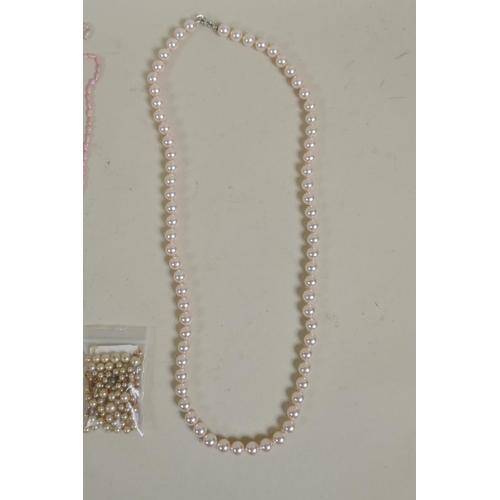 674 - A collection of pearl necklaces, pendants, studs, earrings and loose beads