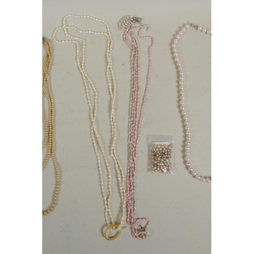 674 - A collection of pearl necklaces, pendants, studs, earrings and loose beads