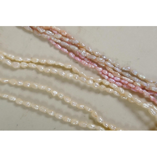 674 - A collection of pearl necklaces, pendants, studs, earrings and loose beads