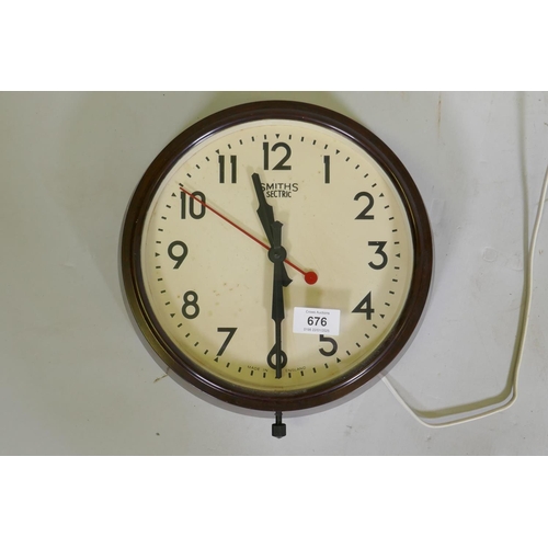 676 - A bakelite Smiths Sectric wall clock, 30cm diameter