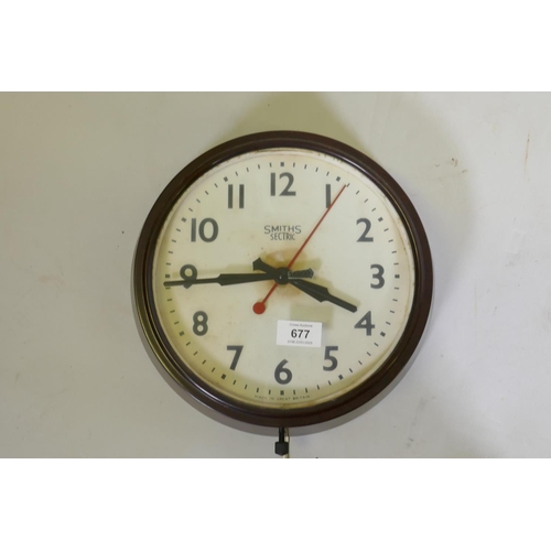 677 - A bakelite Smiths Sectric wall clock, 30cm diameter