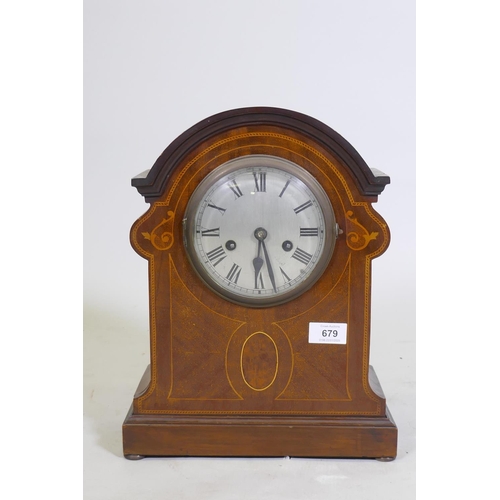 679 - Victorian inlaid mahogany mantel clock, with silvered dial and Roman numerals, the spring movement s... 