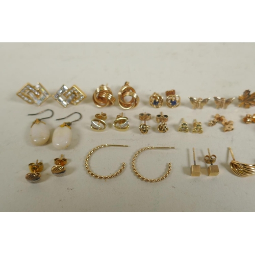 680 - A collection of 9ct, 14ct and 18ct gold and yellow metal earrings, 41g total weight, 9ct, 8g; 14ct, ... 