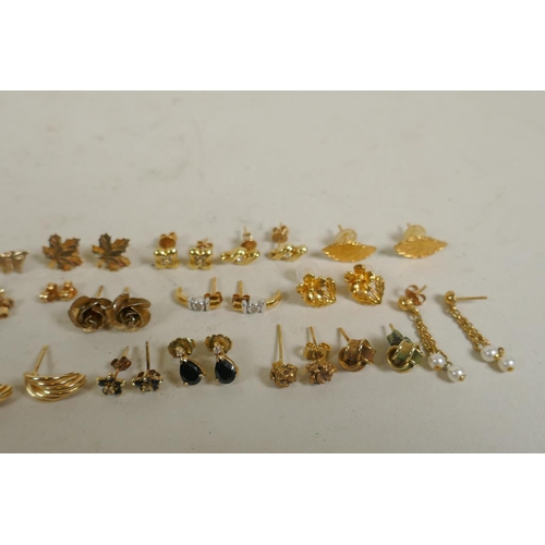 680 - A collection of 9ct, 14ct and 18ct gold and yellow metal earrings, 41g total weight, 9ct, 8g; 14ct, ... 