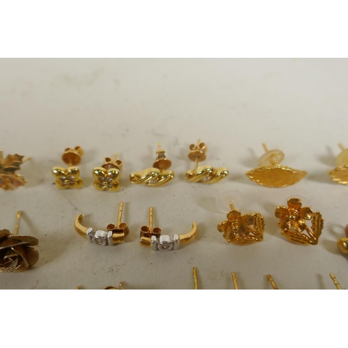 680 - A collection of 9ct, 14ct and 18ct gold and yellow metal earrings, 41g total weight, 9ct, 8g; 14ct, ... 