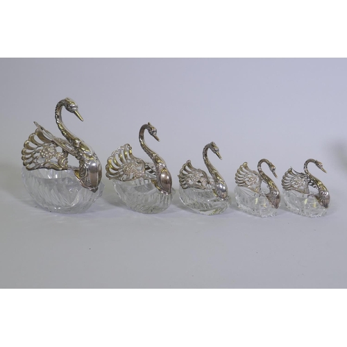 684 - Set of five hallmarked sterling silver mounted cut glass bowls in the form of swans, AF one wing det... 