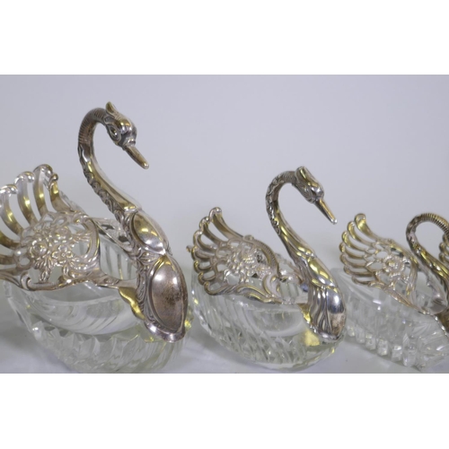 684 - Set of five hallmarked sterling silver mounted cut glass bowls in the form of swans, AF one wing det... 