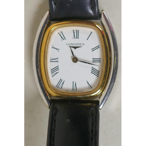 687 - A Longines 'Tonneau' cased stainless steel and gilt 5087 wristwatch with leather strap