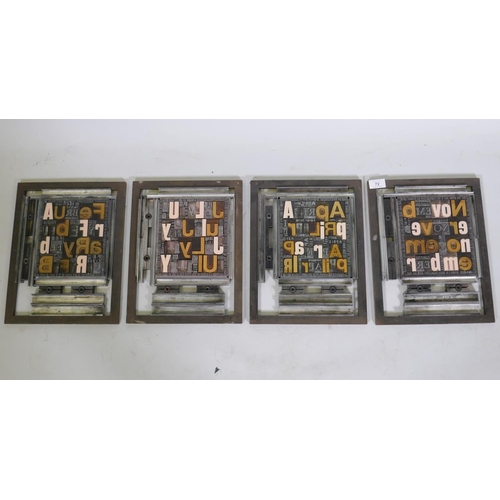 72 - Four printers' frames containing steel and composite typeface of various fonts and size , 27 x 34.5c... 