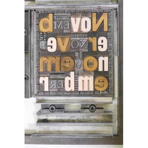 72 - Four printers' frames containing steel and composite typeface of various fonts and size , 27 x 34.5c... 