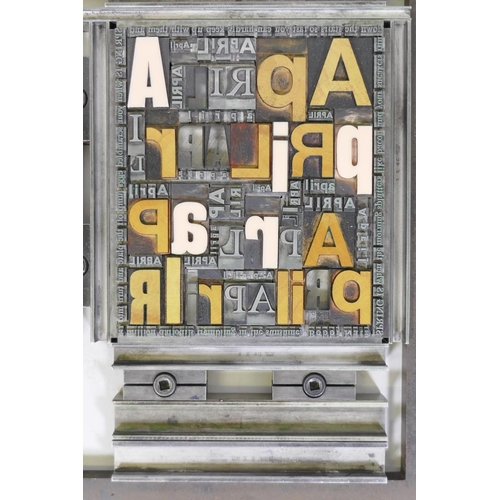 72 - Four printers' frames containing steel and composite typeface of various fonts and size , 27 x 34.5c... 