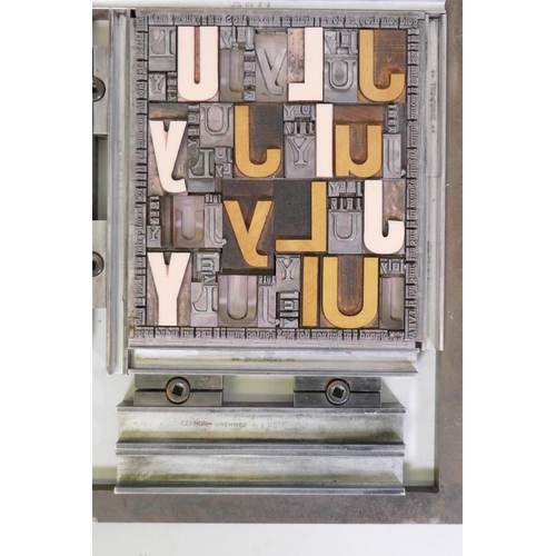 72 - Four printers' frames containing steel and composite typeface of various fonts and size , 27 x 34.5c... 