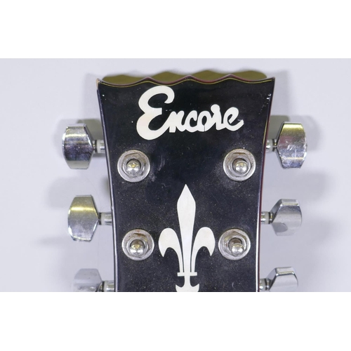 80 - An Encore electric guitar, 100cm long