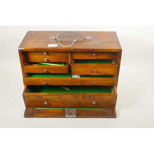 87 - A vintage oak Neslein seven drawer engineers/watchmakers tool chest with detachable/slide front, 44 ... 