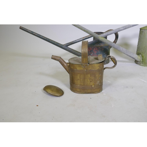 89 - An antique brass watering can, stamped H.J. Hookham & Sons, Birmingham, 25cm high; a Haws patent... 