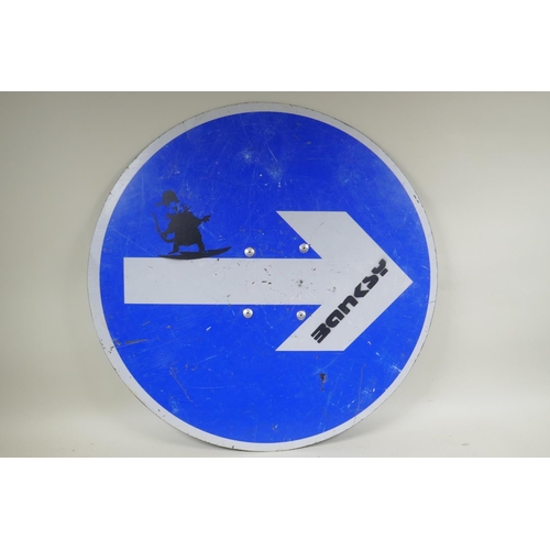 907 - In the style of Banksy, stencilled road sign, 60cm diameter