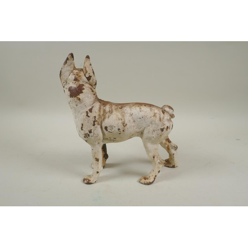 91 - A vintage painted cast iron pug dog, 23cm high, 23cm long