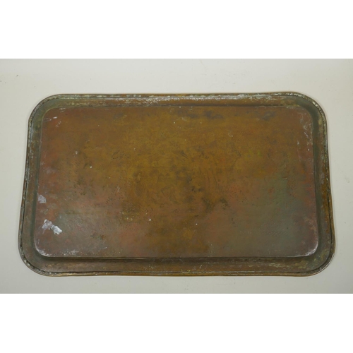 92 - A Persian brass tray with cased decoration of Sha Abbas, 53 x 32cm