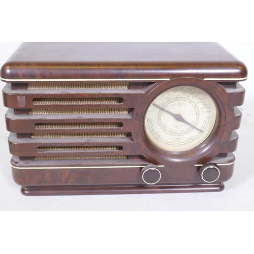 95 - A Kriesler Model 11-20 Art Deco style bakelite valve radio, c.1930s, 23cm high, and a Philips type 3... 