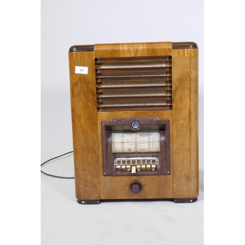 99 - A Pilot T-63 Art Deco style inlaid walnut cased valve radio, 52cm high, and a Pilot Little Maestro b... 