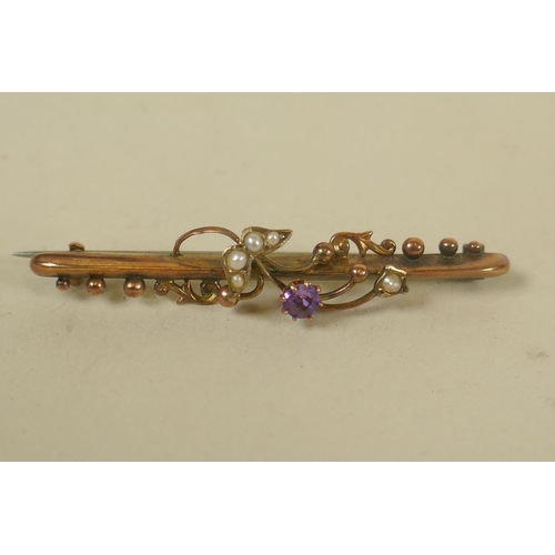 696 - An Edwardian 9ct gold bar brooch, set with seed pearls and amethysts, Birmingham 1907, Sydenham Bros... 