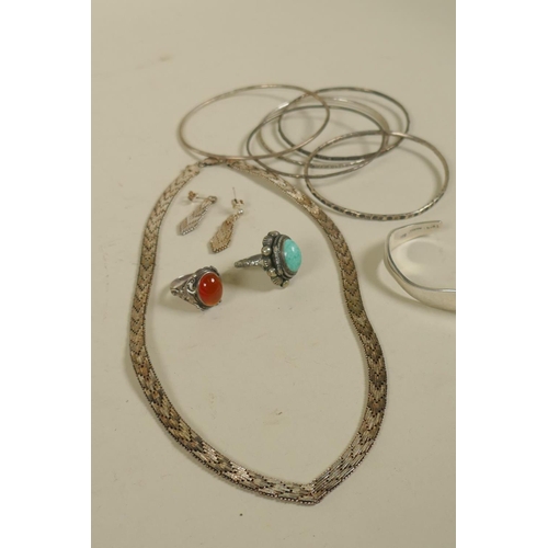 698 - An Italian silver necklace and matching earrings, 42cm long, Mexican silver bangle and others, a sil... 