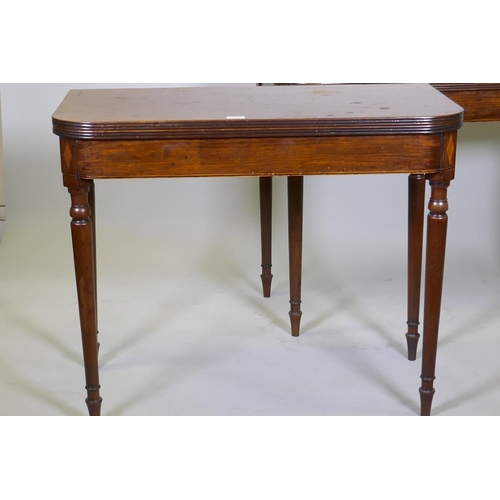 1002 - A good pair of Georgian D-shaped tea tables, with reeded edge tops and line inlaid friezes, raised o... 