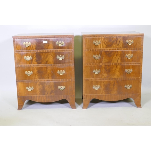 1004 - A pair of Regency style figured mahogany chests of four long drawers, with matched veneer tops and p... 