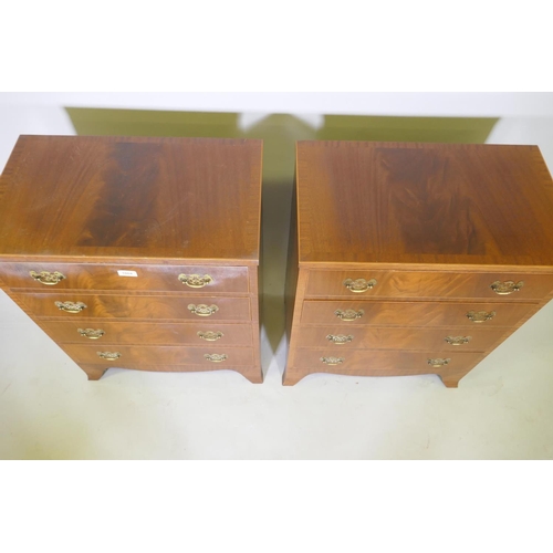 1004 - A pair of Regency style figured mahogany chests of four long drawers, with matched veneer tops and p... 