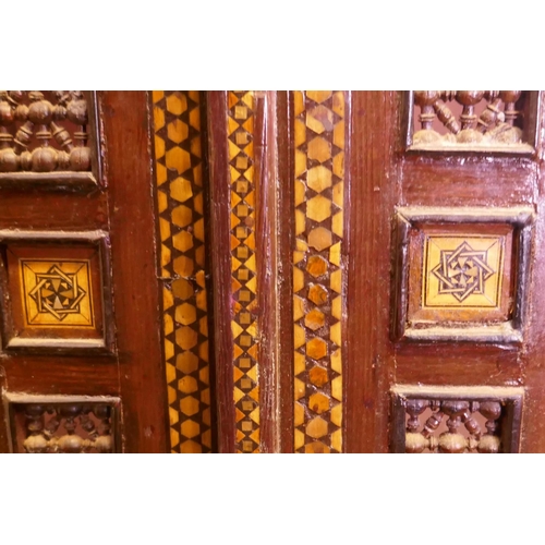 1006 - Late C91th Ottoman inlaid pine armoire with Moorish decoration and carved inscription, the two arche... 