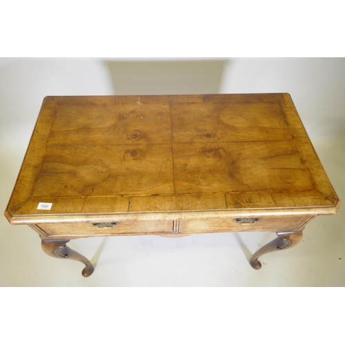 1020 - A Georgian style walnut low boy with two drawers and cabriole supports, 100 x 53cm, 80cm high