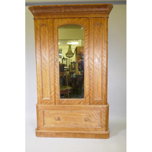 1023 - A Victorian satin birch wardrobe with dome topped mirror door over a single drawer, 125 x 50cm, 200c... 