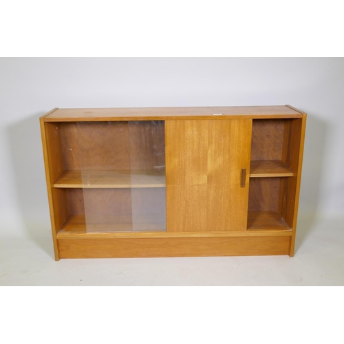 1025 - A mid-century teak side cabinet with slide door and two glass sliding doors, 124 x 28 x 75cm