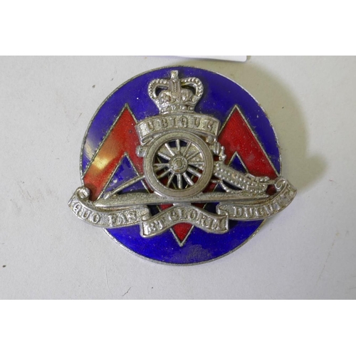 12 - An AA Malay car mascot badge, No.26846, a Royal Artillery motorist's car mascot badge and two Far Ea... 