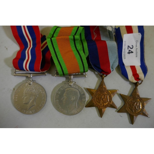 24 - A group of WWII medals, 39-45 Medal, Defence Medal, France and Germany Star and 39-45 Star, all unma... 