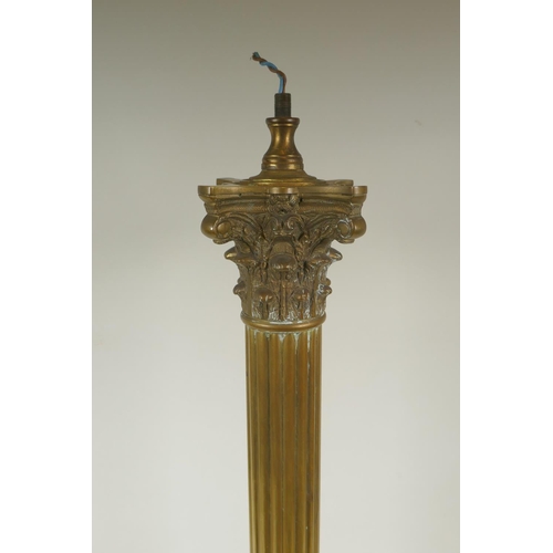 28 - A Victorian brass Corinthian column table lamp, 70cm high