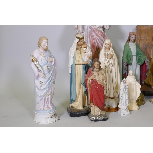 32 - A collection of antique and vintage porcelain and painted plaster religious figures of Christ and th... 