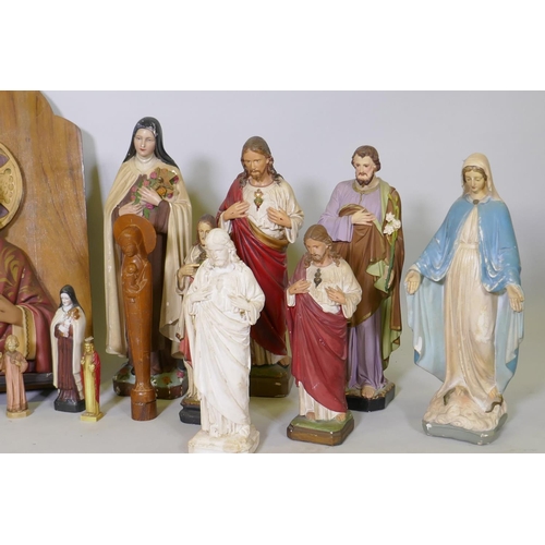 32 - A collection of antique and vintage porcelain and painted plaster religious figures of Christ and th... 