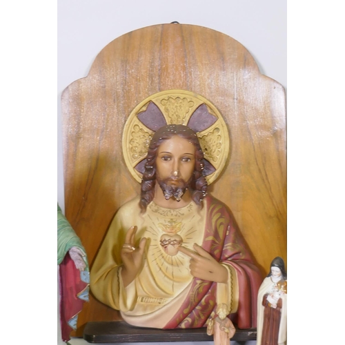 32 - A collection of antique and vintage porcelain and painted plaster religious figures of Christ and th... 