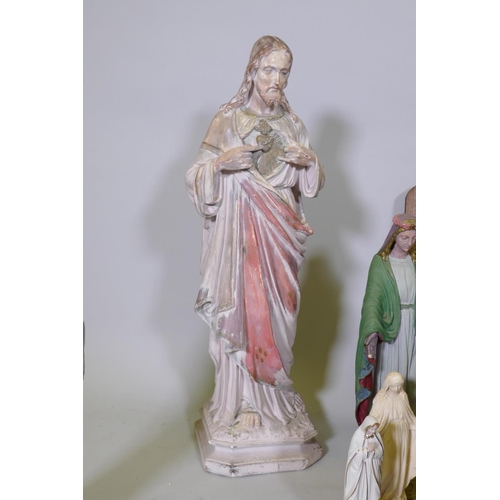 32 - A collection of antique and vintage porcelain and painted plaster religious figures of Christ and th... 