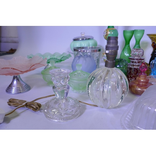 40 - A large collection of antique and later glassware, vases, tazza, carnival glass dishes, jelly moulds... 