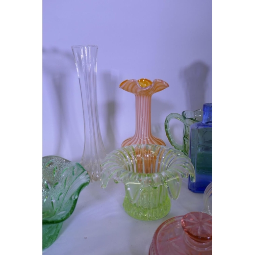 40 - A large collection of antique and later glassware, vases, tazza, carnival glass dishes, jelly moulds... 