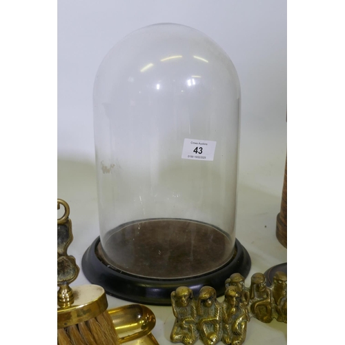 43 - Mixed lot: Victorian glass dome, 29cm high with mis-matched base; Benares ware, brass photo frames, ... 