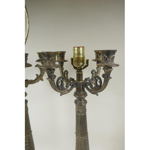 49 - A near pair of bronzed metal and faceted glass four branch column table lamps, 59cm high