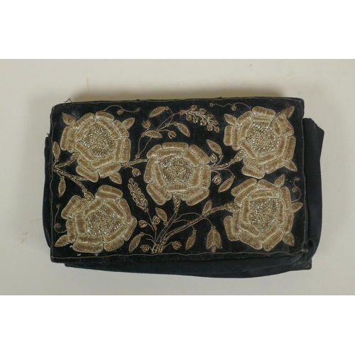 5 - An antique Ottoman velvet clutch bag with silver and gilt thread floral decoration, 22 x 14cm