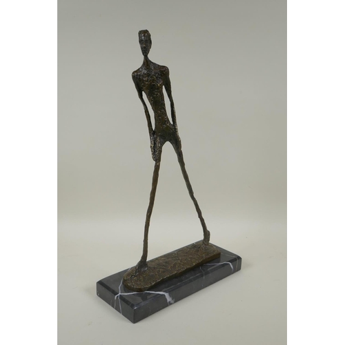 67 - After Alberto Giacometti, (Swiss, 1901-1966), L'homme qui Marche I, bronze figure on a marble base, ... 