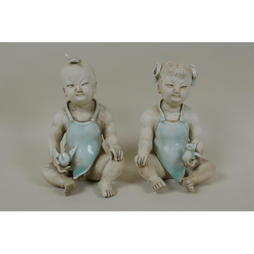 70 - A pair of Chinese song style figures of a boy and girl, 15cm high